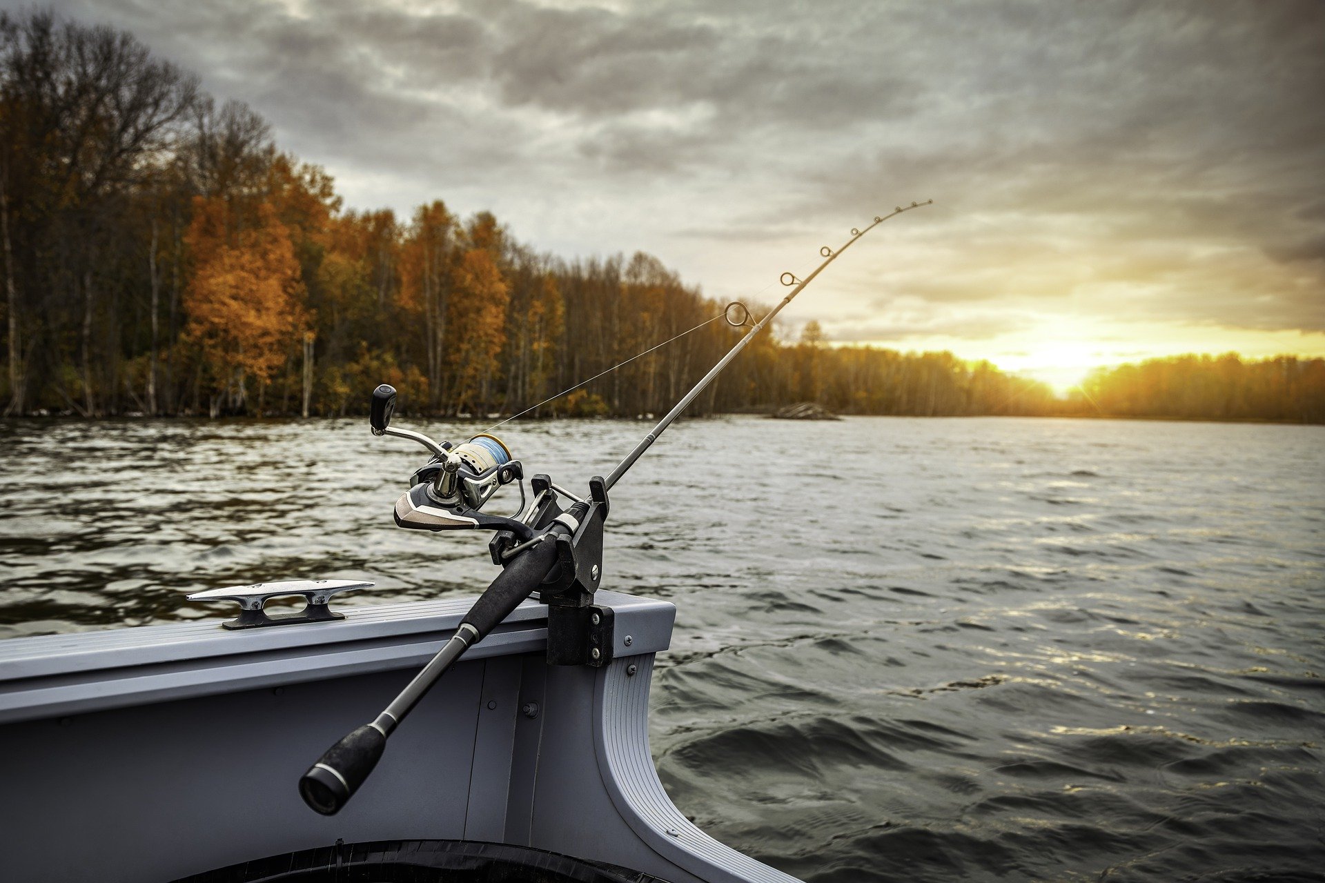 Fishing boat with fishing pole